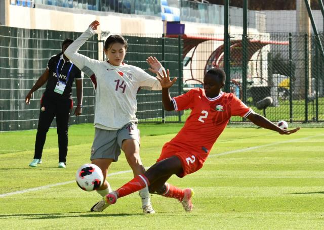 (261020) -- RABAT, Oct. 20, 2026 (Xinhua) -- Li Yaqi (L) of China competes with Ruth Barasa of Kenya during the first round group E football match between China and Kenya at the FIFA U17 Women's World Cup 2026 in Rabat, Morocco, on Oct. 19, 2026. (Photo by Aissa/Xinhua)