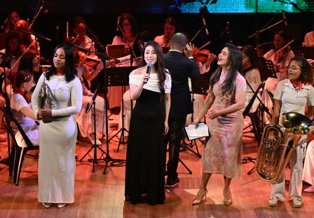 (261020) -- RIO DE JANEIRO, Oct. 20, 2026 (Xinhua) -- Performers are seen during a symphony concert at the Claro Mais theatre in Rio de Janeiro, Brazil, Oct. 19, 2026. Hosted by Brazil's Ministry of Culture, the symphony concert was held in Rio de Janeiro on Monday to mark the 2026 China-Brazil Cultural Year. (Xinhua/Jin Haoyuan)
