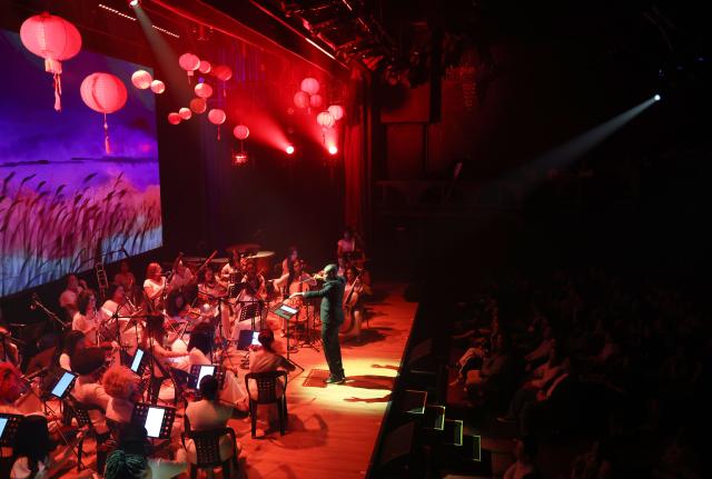 (261020) -- RIO DE JANEIRO, Oct. 20, 2026 (Xinhua) -- The audience watch a symphony concert at the Claro Mais theatre in Rio de Janeiro, Brazil, Oct. 19, 2026. Hosted by Brazil's Ministry of Culture, the symphony concert was held in Rio de Janeiro on Monday to mark the 2026 China-Brazil Cultural Year. (Xinhua/Jin Haoyuan)