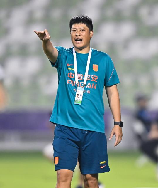(261020) -- DOHA, Oct. 20, 2026 (Xinhua) -- China's head coach Zhang Yaokun reacts during the Gulf Football Federation (GFF) Gulf Cup U-17 Qatar 2026 football match between China and Oman in Doha, Qatar, Oct. 19, 2026. (Photo by Nikku/Xinhua)