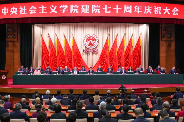 (261020) -- BEIJING, Oct. 20, 2026 (Xinhua) -- Wang Huning, a member of the Standing Committee of the Political Bureau of the Communist Party of China (CPC) Central Committee and chairman of the National Committee of the Chinese People's Political Consultative Conference, addresses a gathering marking the 70th founding anniversary of the Central Institute of Socialism in Beijing, capital of China, Oct. 20, 2026. Chinese President Xi Jinping, also general secretary of the CPC Central Committee and chairman of the Central Military Commission, on Tuesday sent a congratulatory letter to the Central Institute of Socialism, celebrating its 70th founding anniversary. The congratulatory letter was read out at the gathering marking the institute's anniversary in Beijing. (Xinhua/Liu Bin)