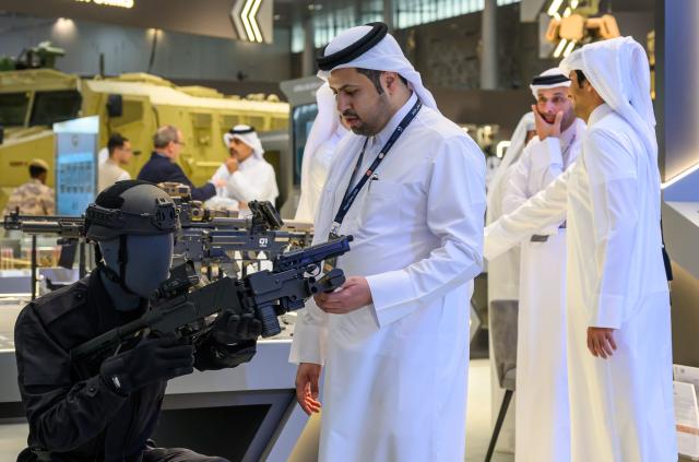 (261020) -- DOHA, Oct. 20, 2026 (Xinhua) -- People visit the Milipol Qatar 2026, an international event for homeland security and civil defense, at Doha Exhibition and Convention Center in Doha, Qatar, Oct. 20, 2026. The three-day exhibition attracted more than 270 exhibitors. (Photo by Nikku/Xinhua)