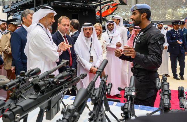 (261020) -- DOHA, Oct. 20, 2026 (Xinhua) -- People visit the Milipol Qatar 2026, an international event for homeland security and civil defense, at Doha Exhibition and Convention Center in Doha, Qatar, Oct. 20, 2026. The three-day exhibition attracted more than 270 exhibitors. (Photo by Nikku/Xinhua)