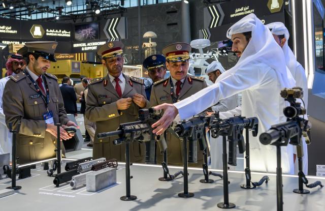 (261020) -- DOHA, Oct. 20, 2026 (Xinhua) -- People visit the Milipol Qatar 2026, an international event for homeland security and civil defense, at Doha Exhibition and Convention Center in Doha, Qatar, Oct. 20, 2026. The three-day exhibition attracted more than 270 exhibitors. (Photo by Nikku/Xinhua)
