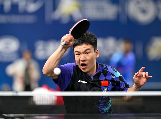 (261020) -- TASHKENT, Oct. 20, 2026 (Xinhua) -- Xiang Peng hits a return during the men's singles round of 128 match between Xiang Peng of China and Alhawai Yousef of United Arab Emirates at the 29th ITTF-Asian Table Tennis Championships in Tashkent, Uzbekistan, Oct. 20, 2026. (Xinhua/Feng Kaihua)