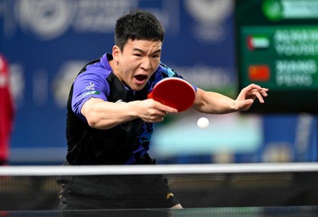 (261020) -- TASHKENT, Oct. 20, 2026 (Xinhua) -- Xiang Peng hits a return during the men's singles round of 128 match between Xiang Peng of China and Alhawai Yousef of United Arab Emirates at the 29th ITTF-Asian Table Tennis Championships in Tashkent, Uzbekistan, Oct. 20, 2026. (Xinhua/Feng Kaihua)