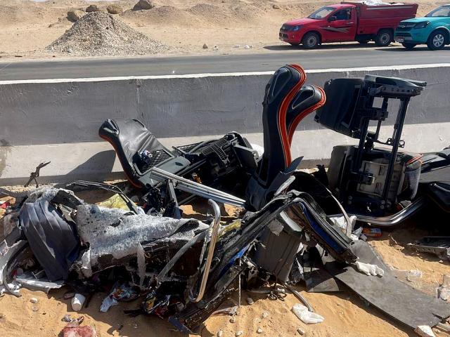(261020) -- CAIRO, Oct. 20, 2026 (Xinhua) -- Photo taken on Oct. 20, 2026 shows a scene of a two-car collision in southwestern Cairo, Egypt. 12 people were killed and 30 others injured in a collision between a bus and a truck on a highway southwest of Cairo on Tuesday, Egypt's Ministry of Health and Population said in a statement. (Photo by Ahmed Abd-Alhady/Xinhua)