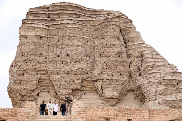 (261020) -- BAGHDAD, Oct. 20, 2026 (Xinhua) -- Visitors tour the grand ziggurat at the ancient site of Dur Kurigalzu in the western outskirts of Baghdad, Iraq, on October 20, 2026. Once the capital of Babylonia, Dur Kurigalzu was founded sometime around the 14th century B.C. by the Kassite King Kurigalzu I. (Photo by Khalil Dawood/Xinhua)