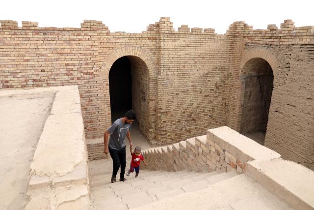 (261020) -- BAGHDAD, Oct. 20, 2026 (Xinhua) -- Visitors tour the grand ziggurat at the ancient site of Dur Kurigalzu in the western outskirts of Baghdad, Iraq, on October 20, 2026. Once the capital of Babylonia, Dur Kurigalzu was founded sometime around the 14th century B.C. by the Kassite King Kurigalzu I. (Photo by Khalil Dawood/Xinhua)