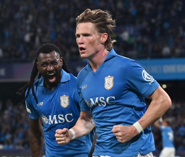 (261021) -- NAPLES, Oct. 21, 2026 (Xinhua) -- Napoli's Scott McTominay (R) reacts after scoring during the UEFA Champions League football match between Napoli and Bodo/Glimt in Naples, Italy, Oct. 20, 2026. (Photo by Augusto Casasoli/Xinhua)