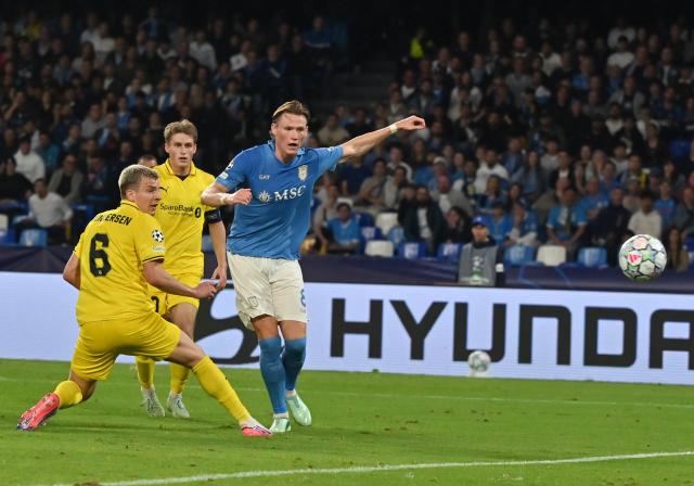 (261021) -- NAPLES, Oct. 21, 2026 (Xinhua) -- Napoli's Scott McTominay (R) scores during the UEFA Champions League football match between Napoli and Bodo/Glimt in Naples, Italy, Oct. 20, 2026. (Photo by Augusto Casasoli/Xinhua)