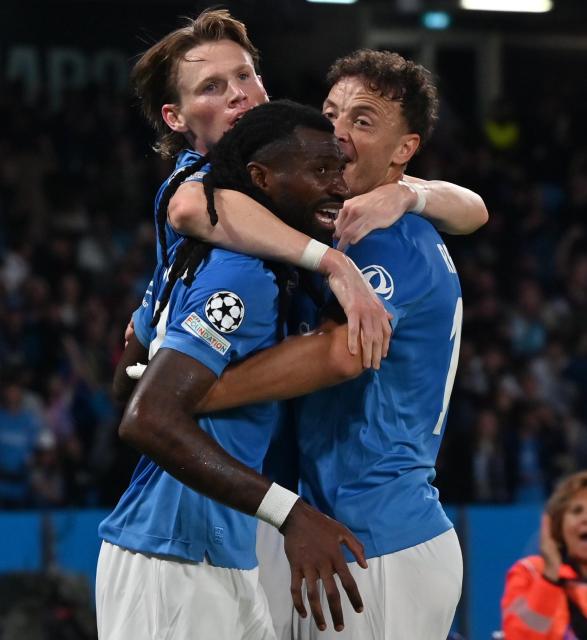(261021) -- NAPLES, Oct. 21, 2026 (Xinhua) -- Napoli's players celebrate a goal during the UEFA Champions League football match between Napoli and Bodo/Glimt in Naples, Italy, Oct. 20, 2026. (Photo by Augusto Casasoli/Xinhua)