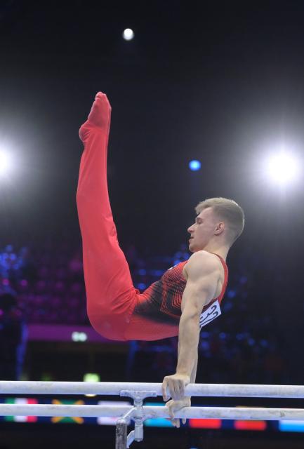 (261021) -- ROTTERDAM, Oct. 21, 2026 (Xinhua) -- Marinov Daniel of World Gymnastics 2 competes during the men's team final at Artistic Gymnastics World Championships 2026 in Rotterdam, the Netherland, Oct.20, 2026. (Xinhua/Weng Xinyang)