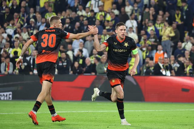 (261021) -- ISTANBUL, Oct. 21, 2026 (Xinhua) -- Wiktor Nowak (L) of SK Slavia Prague and his teammates celebrate a goal during the UEFA Champions League football match between Fenerbahce and SK Slavia Praha in Istanbul, Türkiye, on Oct. 20, 2026. (Photo by Mustafa Kaya/Xinhua)