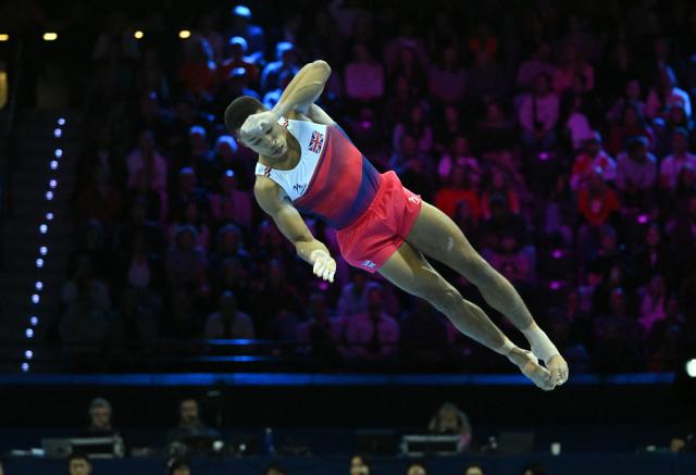 (261021) -- ROTTERDAM, Oct. 21, 2026 (Xinhua) -- Fraser Joe of team Britain competes during the men's team final at Artistic Gymnastics World Championships 2026 in Rotterdam, the Netherland Oct.20, 2026. (Photo by Brinkhorst Eric/Xinhua)