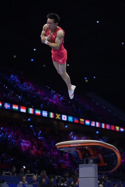 (261021) -- ROTTERDAM, Oct. 21, 2026 (Xinhua) -- Yang Haonan of team China competes during the men's team final at Artistic Gymnastics World Championships 2026 in Rotterdam, the Netherland, Oct. 20, 2026. (Xinhua/Weng Xinyang)