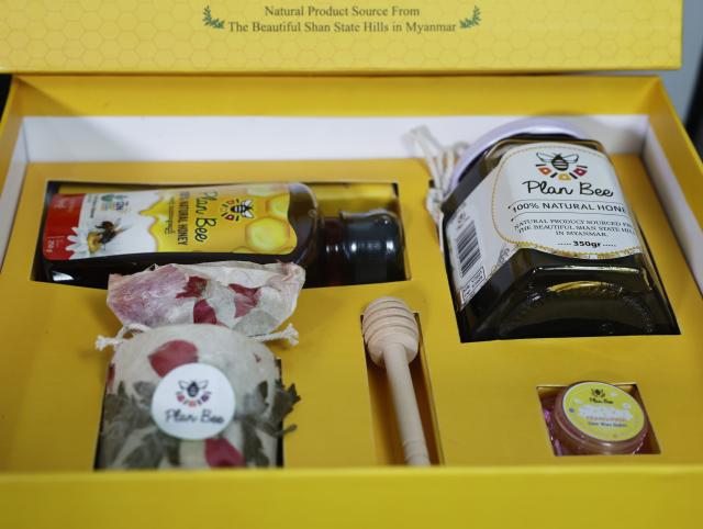 (261021) -- YANGON, Oct. 21, 2026 (Xinhua) -- This photo taken on Oct. 13, 2026 shows products of Plan Bee displayed at its office in Yangon, Myanmar.
  TO GO WITH "Interview: Myanmar social entrepreneur eyes materialising Chinese market opportunities for honey" (Xinhua/San Wai Aung)