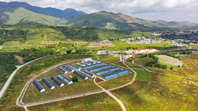 (261021) -- BEIJING, Oct. 21, 2026 (Xinhua) -- A drone photo taken on Sept. 21, 2026 shows a view at Yangling Village of Jingyuan County in Guyuan City, northwest China's Ningxia Hui Autonomous Region.
  The Liupan Mountain runs through Guyuan City in Ningxia. In October 1935, Red Army soldiers crossed Liupan Mountain during the Long March, a historic military maneuver in modern Chinese history. It marks a key turning point in the history of the Long March.
  Now, the Liupan Mountain serves as a crucial ecological barrier and water resource conservation area, and local revolution-themed tourism is booming. Former revolutionary base areas in the region have drawn renewed interest from holidaymakers, with visits offering travelers a chance to learn about China's revolutionary history and reflect on the difficult years that helped shape modern China. (Xinhua/Yang Zhisen)