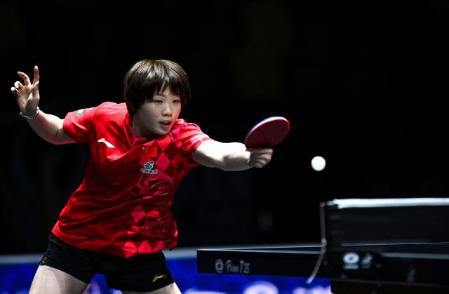 (261021) -- TASHKENT, Oct. 21, 2026 (Xinhua) -- Kuai Man of China hits a return during the women's teams quarterfinals between Kuai Man of China and Sawettabut Suthasini of Thailand at the 29th ITTF-Asian Table Tennis Championships in Tashkent, Uzbekistan, Oct. 21, 2026. (Xinhua/Feng Kaihua)