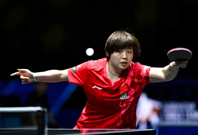 (261021) -- TASHKENT, Oct. 21, 2026 (Xinhua) -- Kuai Man of China hits a return during the women's teams quarterfinals between Kuai Man of China and Sawettabut Suthasini of Thailand at the 29th ITTF-Asian Table Tennis Championships in Tashkent, Uzbekistan, Oct. 21, 2026. (Xinhua/Feng Kaihua)
