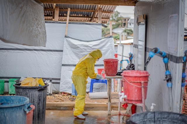 (261021) -- KINSHASA, Oct. 21, 2026 (Xinhua) -- A medical worker disinfects hands at an Ebola treatment center in Bunia, capital of Ituri Province in the Democratic Republic of the Congo (DRC), on Oct. 18, 2026.
  The Africa Centers for Disease Control and Prevention (Africa CDC) has called for greater global solidarity and international support to contain the rapidly expanding Bundibugyo Ebola outbreak.
  TO GO WITH "Africa CDC urges greater global solidarity to contain Ebola as Nigeria confirms 1st case" (Xinhua)