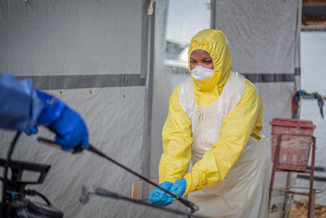 (261021) -- KINSHASA, Oct. 21, 2026 (Xinhua) -- Medical workers carry out disinfection work at an Ebola treatment center in Bunia, capital of Ituri Province in the Democratic Republic of the Congo (DRC), on Oct. 18, 2026.
  The Africa Centers for Disease Control and Prevention (Africa CDC) has called for greater global solidarity and international support to contain the rapidly expanding Bundibugyo Ebola outbreak.
  TO GO WITH "Africa CDC urges greater global solidarity to contain Ebola as Nigeria confirms 1st case" (Xinhua)