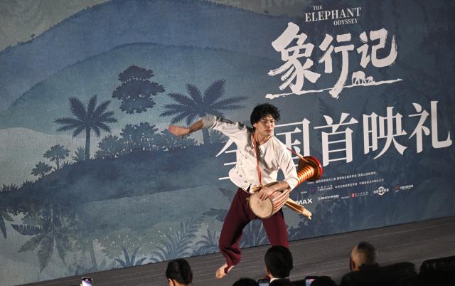 (261021) -- BEIJING, Oct. 21, 2026 (Xinhua) -- An actor performs during the premiere in Beijing, capital of China, Oct. 21, 2026. The premiere of the documentary film "The Elephant Odyssey", which follows the improbable journey of the wandering Asian elephants in southwest China's Yunnan Province that captivated viewers around the world, was held in Beijing on Wednesday. 
In March 2020, the elephants left a forest nature reserve in Xishuangbanna Dai Autonomous Prefecture, Yunnan Province, and trekked about 500 km northwards to the provincial capital Kunming, arriving in June 2021. They have since headed south again, arriving safely back at the nature reserve.
The film is a collaborative effort between film institutions from China, Canada and Singapore, representing a valuable attempt to tell the story of China's ecological conservation. (Xinhua/Jin Liangkuai)