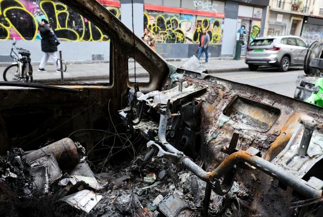 (261021) -- PARIS, Oct. 21, 2026 (Xinhua) -- A vehicle destroyed by fire during the earlier demonstration is seen on a street in Paris, France, Oct. 21, 2026. The French government has vowed to do everything within its power to prevent violence at fresh social demonstrations announced for Saturday, after riots around the country caused widespread destruction and thousands of arrests on Oct. 17. (Xinhua/Wu Huiwo)