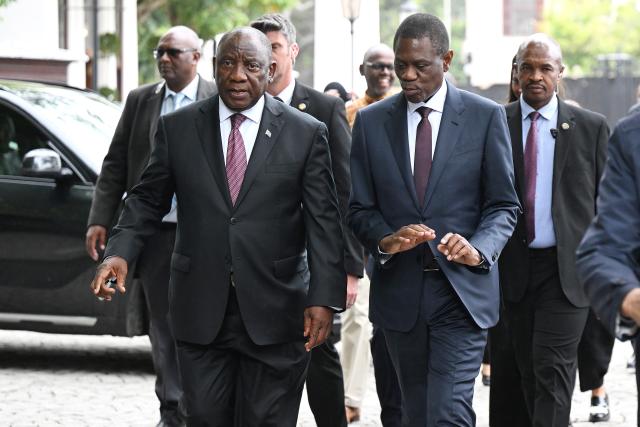 (261022) -- CAPE TOWN, Oct. 22, 2026 (Xinhua) -- South African President Cyril Ramaphosa (L, front) and Deputy President Paul Mashatile (R, front) arrive at the Parliament to attend the Medium-Term Budget Policy Statement in Cape Town, South Africa, Oct. 21, 2026.
  South Africa has lowered its economic growth forecast for 2026 to 1.2 percent and announced temporary fuel levy cuts to ease cost-of-living pressures, Finance Minister Enoch Godongwana said on Wednesday.
  TO GO WITH "South Africa lowers 2026 growth forecast, cuts fuel levies to ease cost pressures" (Photo by Xabiso Mkhabela/Xinhua)