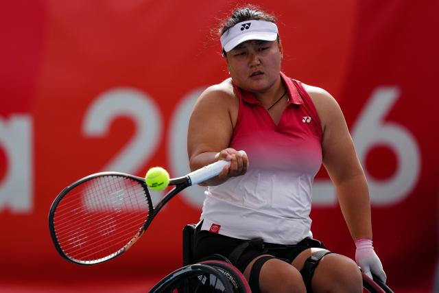 (261022) -- NAGOYA, Oct. 22, 2026 (Xinhua) -- Li Xiaohui returns a shot during the women's wheelchair tennis final between Li Xiaohui of China and Kamiji Yui of Japan at the Aichi-Nagoya Asian Para Games in Nagoya, Japan, Oct. 22, 2026. (Xinhua/Jia Haocheng)