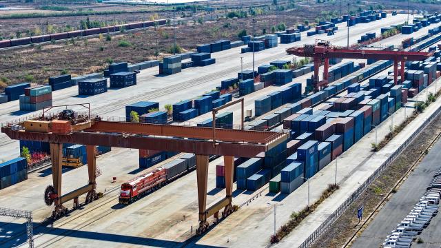 (261022) -- SHENYANG, Oct. 22, 2026 (Xinhua) -- A drone photo taken on Oct. 22, 2026 shows a freight train loaded with containers departing from Puhe station in Shenyang, northeast China's Liaoning Province.
  A China-Europe freight train bound for Moscow departed Puhe station in Shenyang, northeast China's Liaoning Province, at around 11:30 a.m. Thursday, bringing the service's cumulative trips to top 140,000 and transporting goods worth over 560 billion U.S. dollars since 2011.
  Within China, 96 scheduled routes for trains traveling at 120 km per hour link 132 cities along the western, central and eastern corridors, while overseas the network now runs on three lines: northern, central and southern. Together they reach 237 cities in 26 European countries and more than 100 cities in 12 Asian countries, covering most parts of Eurasia, according to China State Railway Group Co., Ltd. (China Railway), the national rail operator.
  The southern route is now operating on regular basis, running 746 trains in the first nine months of 2026, up 125 percent year on year. (Xinhua/Pan Yulong)