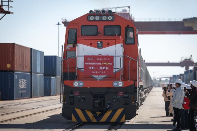 (261022) -- SHENYANG, Oct. 22, 2026 (Xinhua) -- A freight train loaded with containers departs from Puhe station in Shenyang, northeast China's Liaoning Province, Oct. 22, 2026.
  A China-Europe freight train bound for Moscow departed Puhe station in Shenyang, northeast China's Liaoning Province, at around 11:30 a.m. Thursday, bringing the service's cumulative trips to top 140,000 and transporting goods worth over 560 billion U.S. dollars since 2011.
  Within China, 96 scheduled routes for trains traveling at 120 km per hour link 132 cities along the western, central and eastern corridors, while overseas the network now runs on three lines: northern, central and southern. Together they reach 237 cities in 26 European countries and more than 100 cities in 12 Asian countries, covering most parts of Eurasia, according to China State Railway Group Co., Ltd. (China Railway), the national rail operator.
  The southern route is now operating on regular basis, running 746 trains in the first nine months of 2026, up 125 percent year on year. (Xinhua/Pan Yulong)