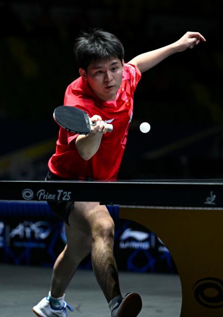 (261022) -- TASHKENT, Oct. 22, 2026 (Xinhua) -- Lin Shidong of China hits a return during the men's teams semifinals against Feng Yi-Hsin of Chinese Taipei at the 29th ITTF-Asian Table Tennis Championships in Tashkent, Uzbekistan, Oct. 22, 2026. (Xinhua/Feng Kaihua)