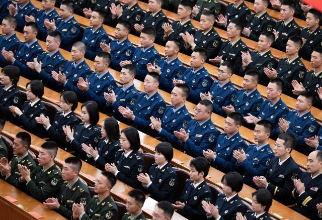 (261022) -- BEIJING, Oct. 22, 2026 (Xinhua) -- A gathering commemorating the 90th anniversary of the victory of the Red Army's Long March is held at the Great Hall of the People in Beijing, capital of China, Oct. 22, 2026. (Xinhua/Li Tao)