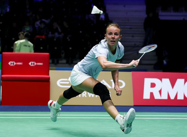(261022) -- PARIS, Oct. 22, 2026 (Xinhua) -- Mia Blichfeldt of Denmark hits a return during the women's singles round of 16 match against Han Yue of China at the French Open badminton tournament in Paris, France, Oct. 22, 2026. (Xinhua/Wu Huiwo)