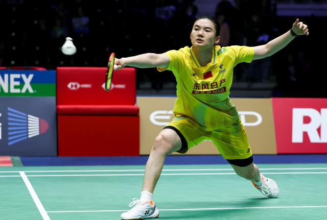 (261022) -- PARIS, Oct. 22, 2026 (Xinhua) -- Han Yue of China hits a return during the women's singles round of 16 match against Mia Blichfeldt of Denmark at the French Open badminton tournament in Paris, France, Oct. 22, 2026. (Xinhua/Wu Huiwo)