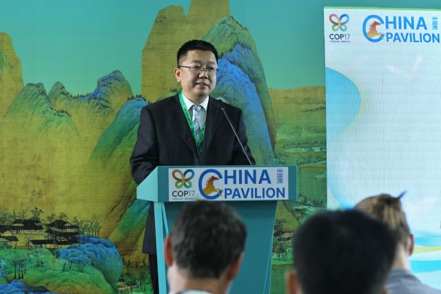 (261022) -- YEREVAN, Oct. 22, 2026 (Xinhua) -- Hu Jun, director of the Research Center for Xi Jinping Thought on Ecological Civilization, delivers a speech during a side event of the 17th meeting of the Conference of the Parties to the United Nations (UN) Convention on Biological Diversity (COP17) in Yerevan, Armenia, Oct. 21, 2026. The English version of a think tank report on China's Ecological and Environmental Code was released Wednesday in Yerevan, the capital of Armenia.
   The report, titled "China's Innovations and Global Contributions Through the Ecological and Environmental Code," was released at the China Pavilion during the COP17. (Xinhua/Chen Junfeng)
