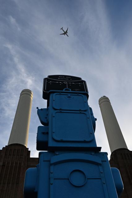 (261022) -- LONDON, Oct. 22, 2026 (Xinhua) -- This photo taken on Oct. 22, 2026 shows an art installation adapted from a switch-gear panel outside Battersea Power Station in London, Britain. Located on the south bank of the River Thames in London, Battersea Power Station was built in two main phases between 1929 and 1955. At its peak, the coal-fired power station supplied about one-fifth of London's electricity, powering important buildings including Buckingham Palace and the Houses of Parliament.
The building, known for its four white chimneys, stood derelict for decades after electricity generation ceased in 1983. Following restoration and redevelopment, the former industrial landmark reopened to the public in 2022 as a mixed-use complex featuring shops, restaurants, offices, homes and leisure facilities. (Xinhua/Li Mangmang)