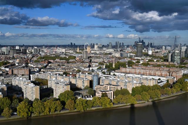(261022) -- LONDON, Oct. 22, 2026 (Xinhua) -- This photo taken on Oct. 22, 2026 shows a view of central London seen from the top of the 109-meter north-west chimney of Battersea Power Station in London, Britain. Located on the south bank of the River Thames in London, Battersea Power Station was built in two main phases between 1929 and 1955. At its peak, the coal-fired power station supplied about one-fifth of London's electricity, powering important buildings including Buckingham Palace and the Houses of Parliament.
The building, known for its four white chimneys, stood derelict for decades after electricity generation ceased in 1983. Following restoration and redevelopment, the former industrial landmark reopened to the public in 2022 as a mixed-use complex featuring shops, restaurants, offices, homes and leisure facilities. (Xinhua/Li Mangmang)