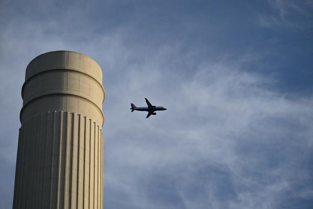(261022) -- LONDON, Oct. 22, 2026 (Xinhua) -- An airliner passes by the north-west chimney of Battersea Power Station in London, Britain, Oct. 22, 2026. Located on the south bank of the River Thames in London, Battersea Power Station was built in two main phases between 1929 and 1955. At its peak, the coal-fired power station supplied about one-fifth of London's electricity, powering important buildings including Buckingham Palace and the Houses of Parliament.
The building, known for its four white chimneys, stood derelict for decades after electricity generation ceased in 1983. Following restoration and redevelopment, the former industrial landmark reopened to the public in 2022 as a mixed-use complex featuring shops, restaurants, offices, homes and leisure facilities. (Xinhua/Li Mangmang)