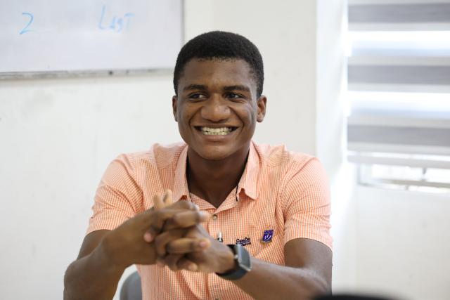 (261022) -- ACCRA, Oct. 22, 2026 (Xinhua) -- Austin Elikem Afiawo, a final-year Chinese language and linguistics student at the University of Ghana, speaks during an interview with Xinhua in Accra, Ghana, on Oct. 14, 2026. TO GO WITH "Feature: When a Ghanaian college student meets with Chinese traditional face-changing art" (Photo by Seth/Xinhua)