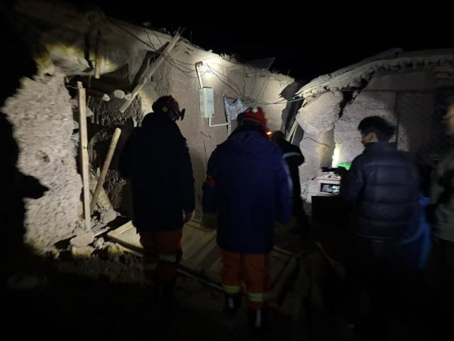 (261023) -- NAGQU, Oct. 23, 2026 (Xinhua) -- Firefighters inspect an earthquake-hit village in Baqen County of Nagqu City in southwest China's Xizang Autonomous Region, on Oct. 23, 2026.
  Sixteen people were killed and 32 others injured after a 7.0-magnitude earthquake struck Baqen County of Nagqu City in southwest China's Xizang Autonomous Region at 10:33 p.m. Thursday (Beijing Time), according to the city's emergency management bureau.
  As of 2:25 a.m. Friday, 11 of the injured were in serious condition while 21 sustained minor injuries. Over 300 houses collapsed.
  The damage caused by the quake is being further evaluated, and disaster relief work is underway.
  More than 300 police officers have been dispatched to the epicenter for relief work while the regional fire and rescue corps has mobilized 347 personnel to the affected areas. (Xinhua)