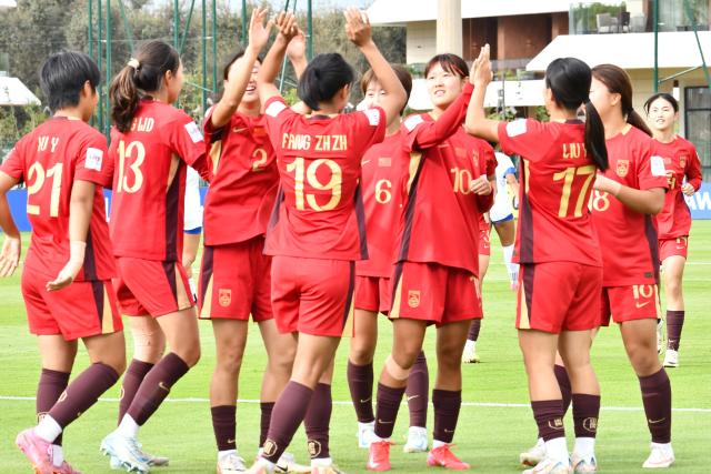 (261023) -- RABAT, Oct. 23, 2026 (Xinhua) -- Players of China celebrate after a goal during the Group E match between China and Samoa at the 2026 FIFA U-17 Women's World Cup in Rabat, Morocco, on Oct. 22, 2026. (Photo by Aissa/Xinhua)