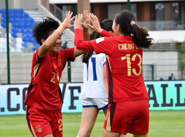 (261023) -- RABAT, Oct. 23, 2026 (Xinhua) -- China's Xu Yue (L) celebrates with her teammate Cheng Wandi during the Group E match between China and Samoa at the 2026 FIFA U-17 Women's World Cup in Rabat, Morocco, on Oct. 22, 2026. (Photo by Aissa/Xinhua)
