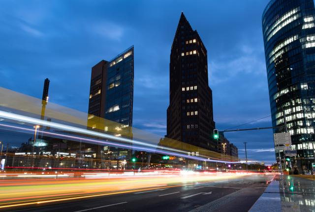 (261023) -- BERLIN, Oct. 23, 2026 (Xinhua) -- This long-exposure photo taken on Oct. 22, 2026 shows vehicles running past the Potsdamer Platz in Berlin, Germany.
  Berlin is located in northeastern Germany and is the country's capital and largest city. The city boasts historic buildings that reflect its rich history, while retaining a vibrant and cosmopolitan character. (Xinhua/Zhang Haofu)
