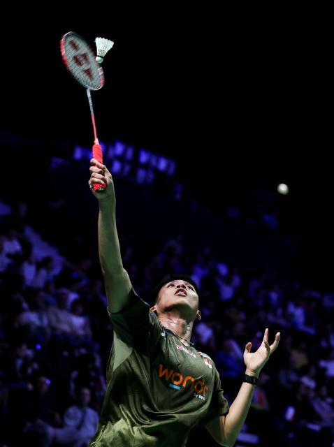 (261023) -- PARIS, Oct. 23, 2026 (Xinhua) -- Moh. Zaki Ubaidillah of Indonesia hits a return during the men's singles 1/8 final match between Moh. Zaki Ubaidillah of Indonesia and Watanabe Koki of Japan at the French Open badminton tournament in Paris, France, Oct. 22, 2026. (Xinhua/Wu Huiwo)