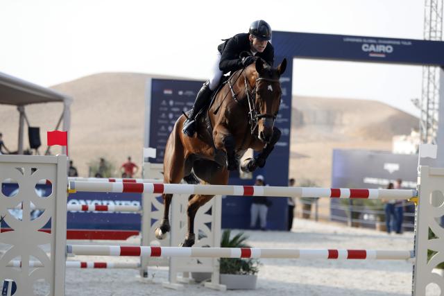 (261023) -- CAIRO, Oct. 23, 2026 (Xinhua) -- Max Kuhner of Austria competes during the CSI5 1.60 meters competition of the Global Champions Tour 2026 at The Great Pyramids, Giza, Egypt on Oct. 22, 2026. (Xinhua/Ahmed Gomaa)