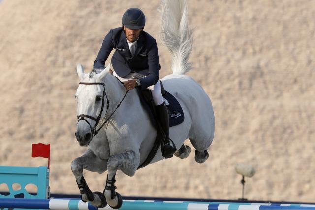 (261023) -- GIZA, Oct. 23, 2026 (Xinhua) -- Christian Kukuk of Germany competes during the CSI5 1.60 meters competition of the Global Champions Tour 2026 at The Great Pyramids, Giza, Egypt on Oct. 22, 2026. (Xinhua/Ahmed Gomaa)