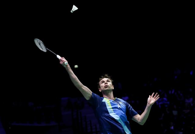 (261023) -- PARIS, Oct. 23, 2026 (Xinhua) -- Rasmus Gemke of Denmark hits a return during the men's singles 1/8 final match between Christo Popov of France and Rasmus Gemke of Denmark at the French Open badminton tournament in Paris, France, Oct. 22, 2026. (Xinhua/Wu Huiwo)