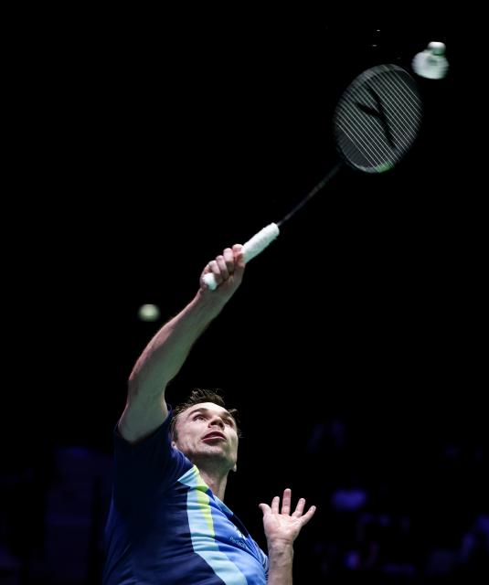 (261023) -- PARIS, Oct. 23, 2026 (Xinhua) -- Rasmus Gemke of Denmark hits a return during the men's singles 1/8 final match between Christo Popov of France and Rasmus Gemke of Denmark at the French Open badminton tournament in Paris, France, Oct. 22, 2026. (Xinhua/Wu Huiwo)